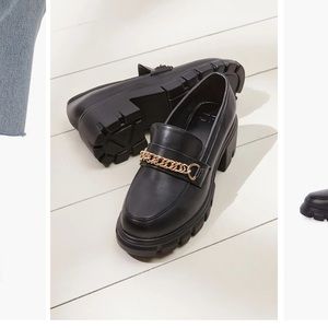 Black platform loafers